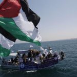 banderas-en-el-puerto-de-gaza-esperando-a-la-flotilla-de-la-libertad-en-2010