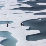 The crew of the U.S. Coast Guard Cutter Healy, in the midst of their ICESCAPE mission, retrieves supplies dropped by parachute in the Arctic Ocean